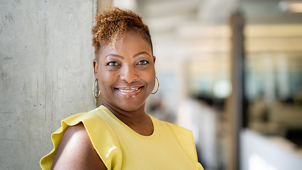 A person smiling for the camera.