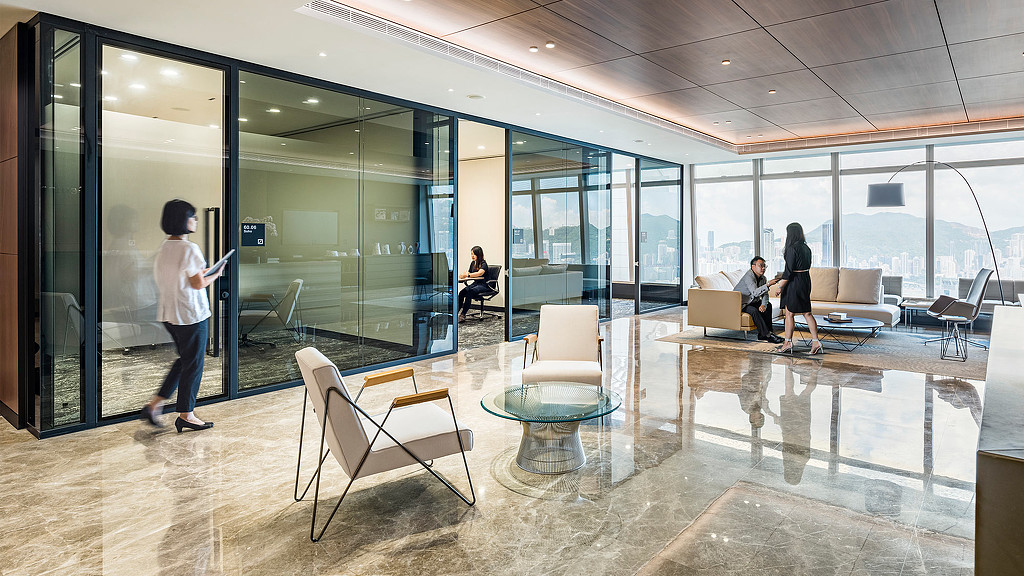Confidential financial services client communal space and meeting rooms.