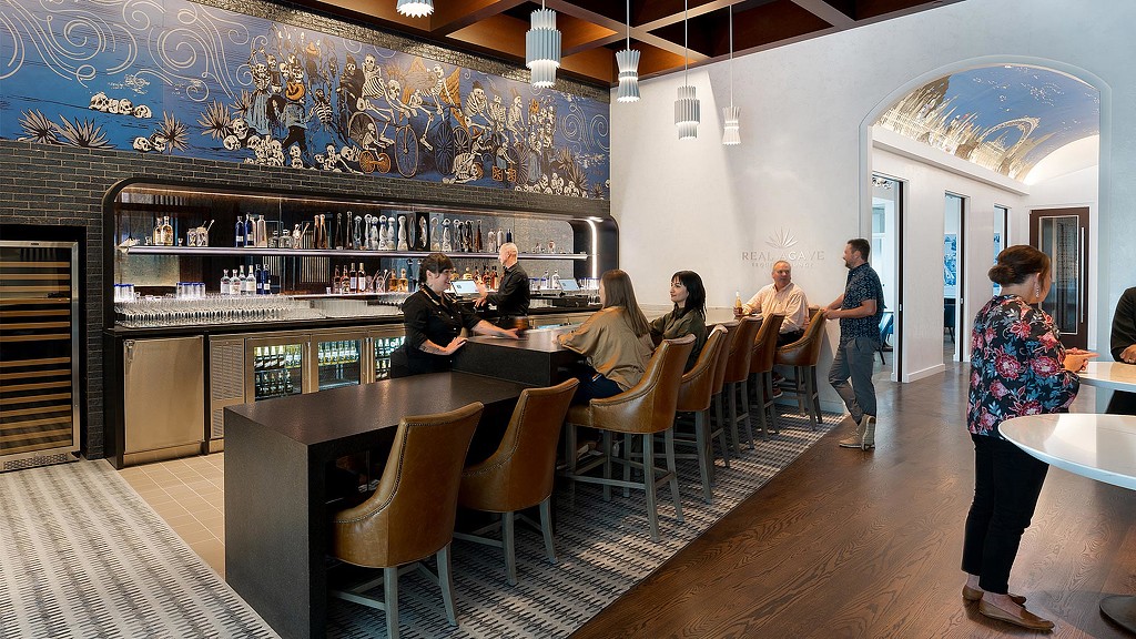 Real Agave tequila bar with patrons.