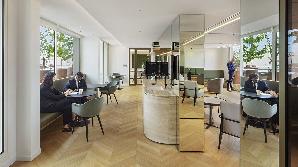 Confidential Paris client office cafe seating.