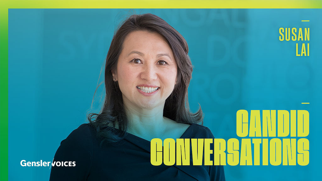 A woman smiling for the camera.