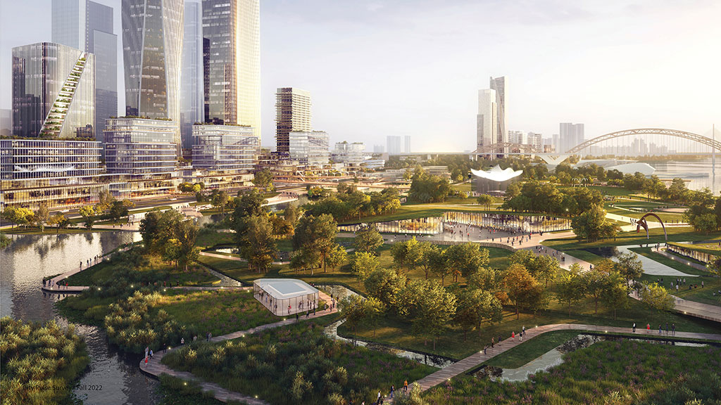 A park with trees and buildings in the background.