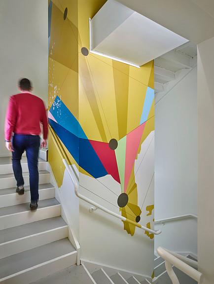 A person walking up a staircase.