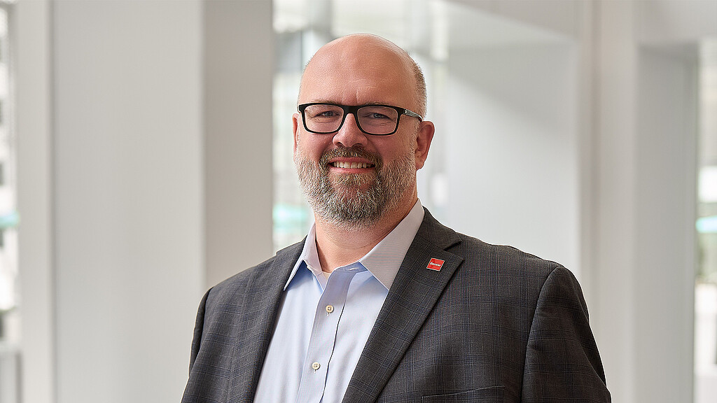 A man wearing glasses.