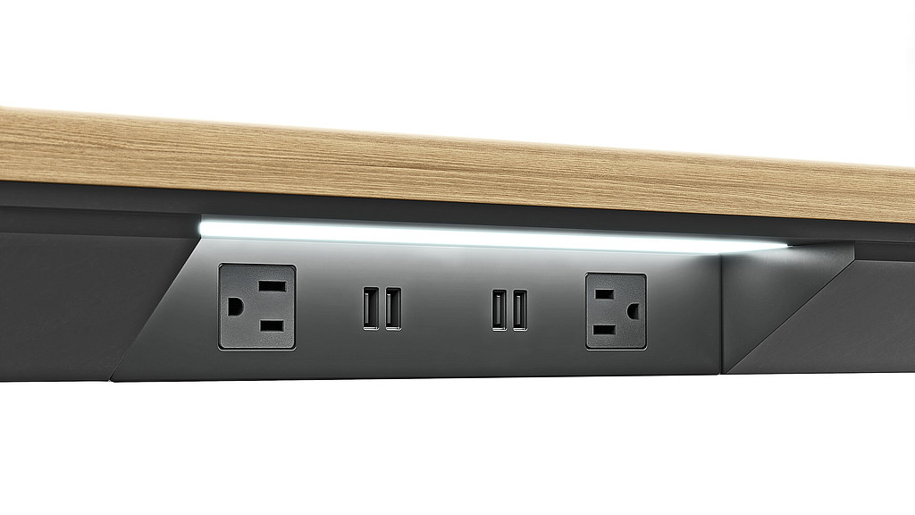 Nucraft table with plugs close-up.