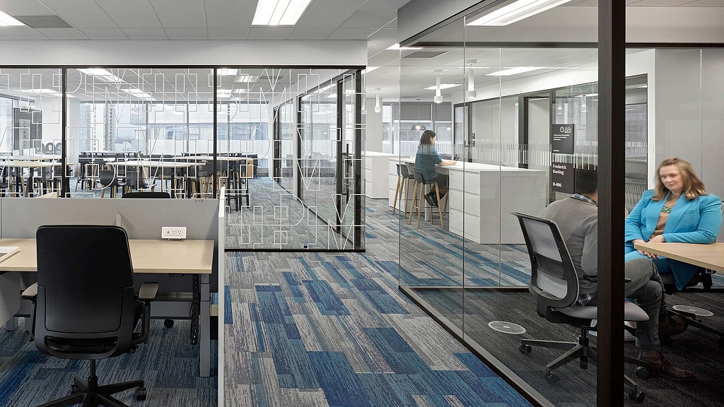 IBM closed meeting rooms adjacent to open workstations
