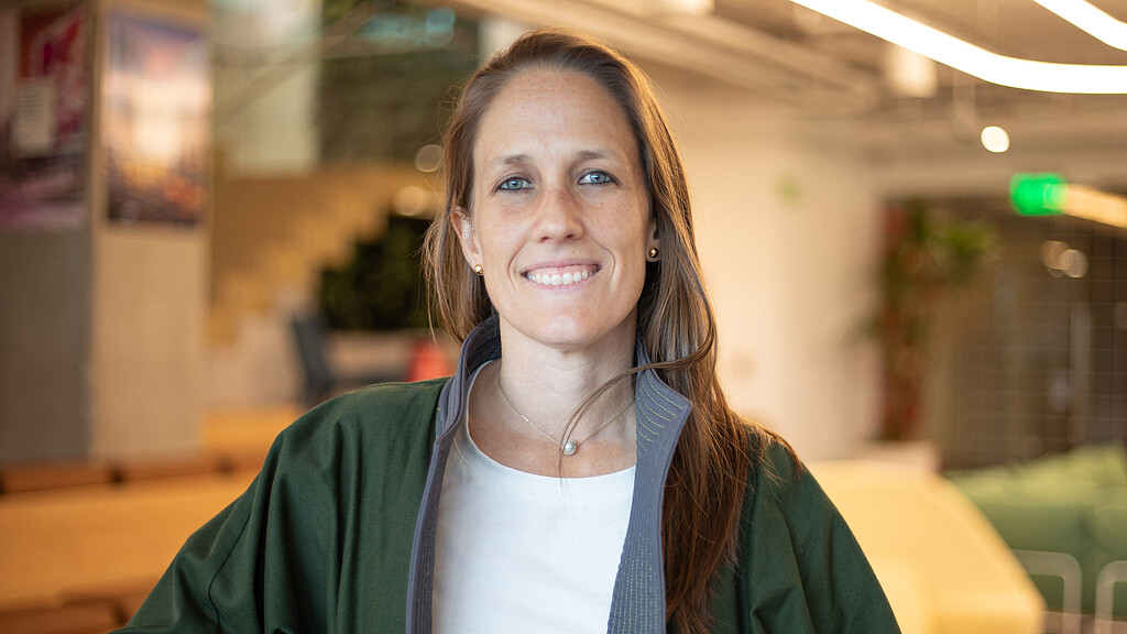 A person smiling at the camera.