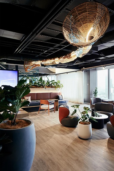 Professional services firm lounge seating and ceiling art installation