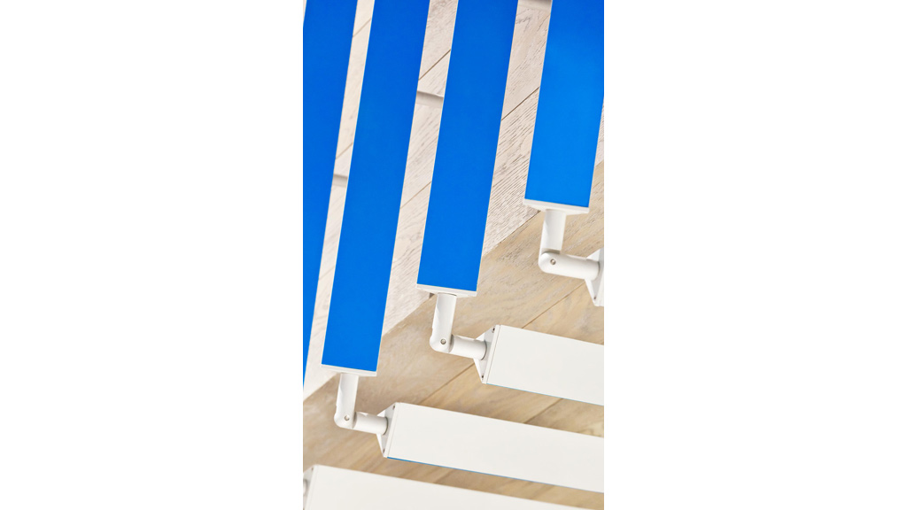 A blue and white striped wall.