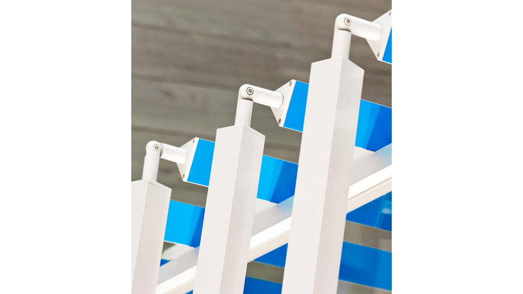 A white and blue metal railing.