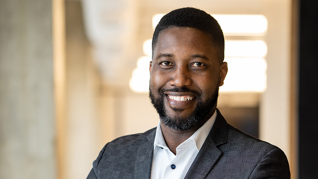 A man smiling for the camera.