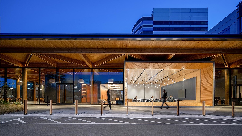 The Lighthouse amenity space exterior at night from the parking lot
