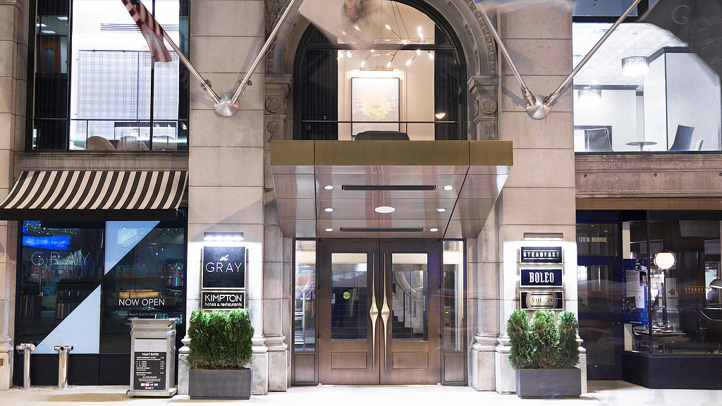 A building with windows and a sign.