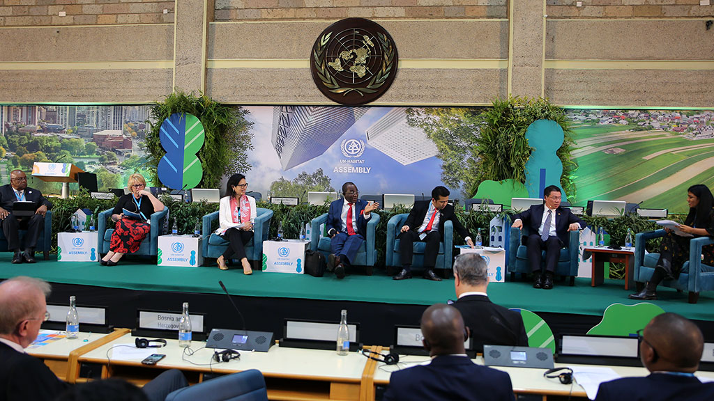 A group of people sitting at a table.