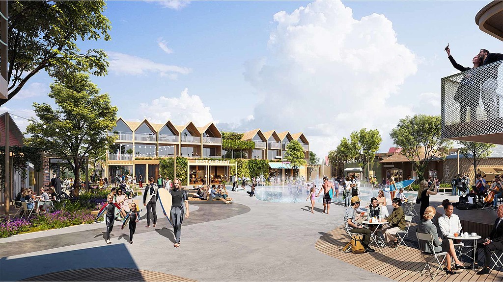 People walking on a paved area.