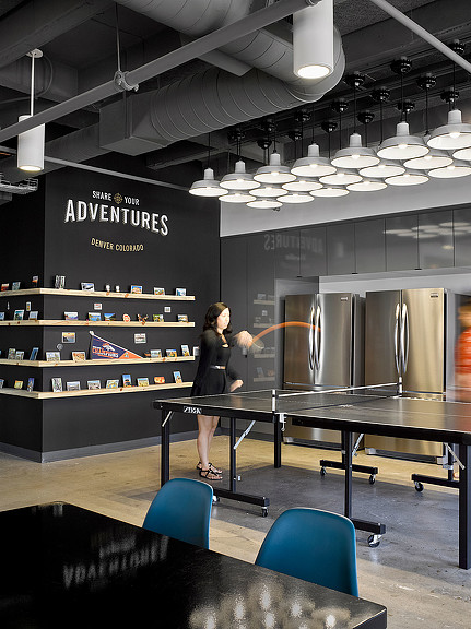 A person standing at a table.