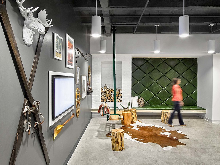 A person walking in a room.