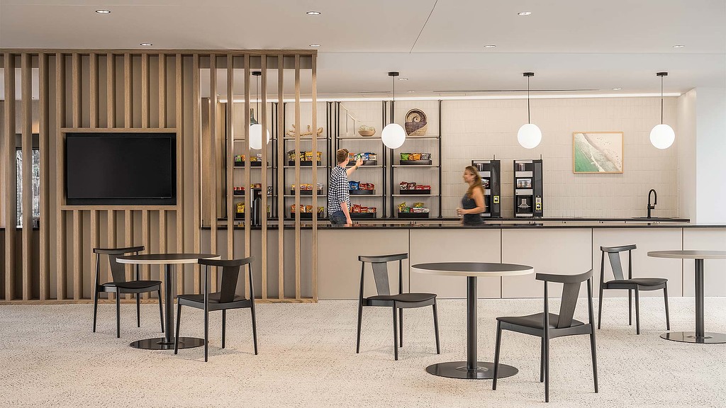 A group of people in a room.