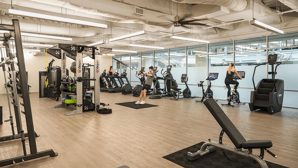 People exercising in a gym.