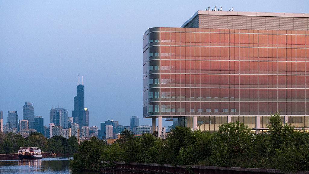 The side of 1229 W Concord as seen from the river with Chicago in the background