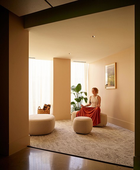 A person sitting on a couch.