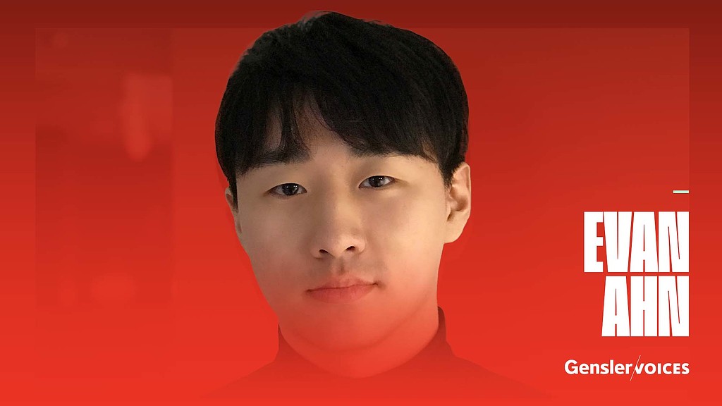 A boy with short black hair.