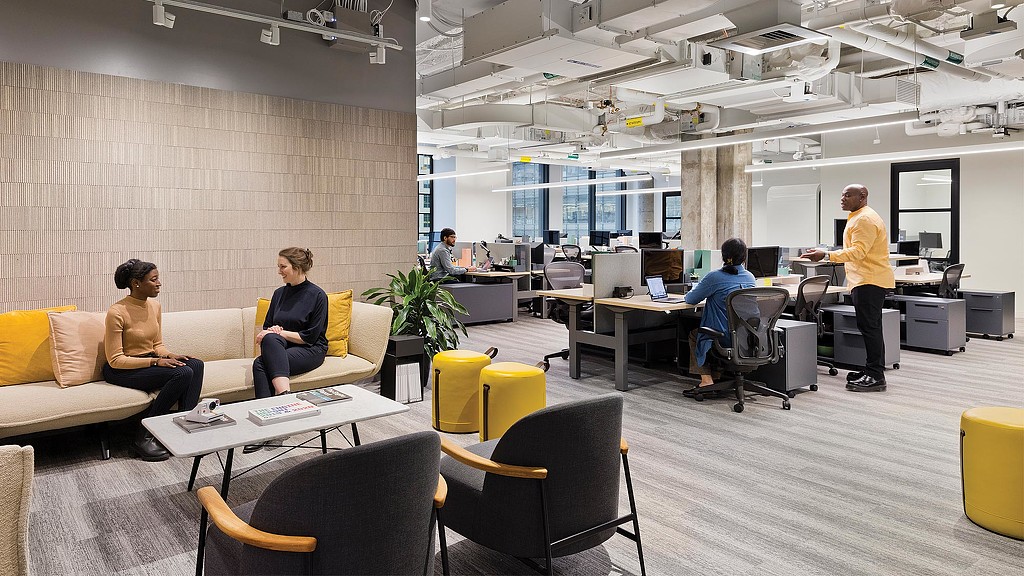 A group of people in a room.