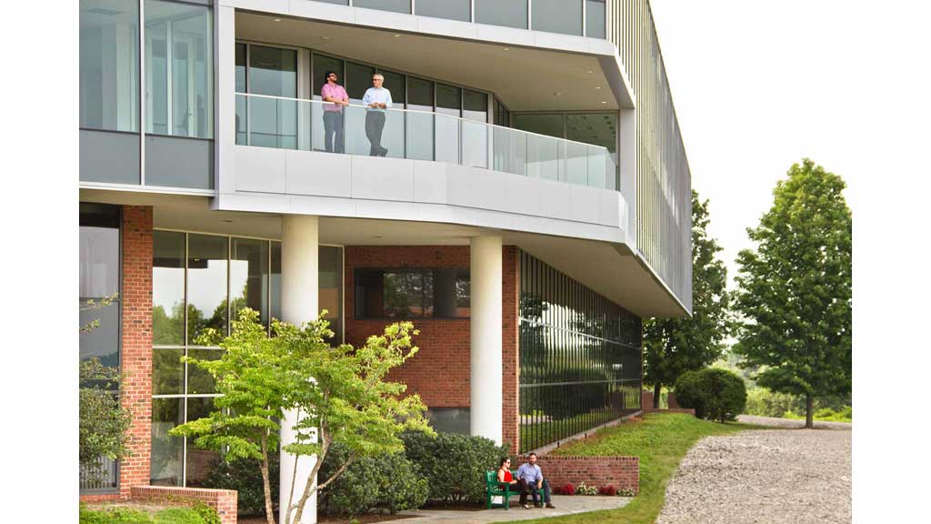People on the balcony of a building.