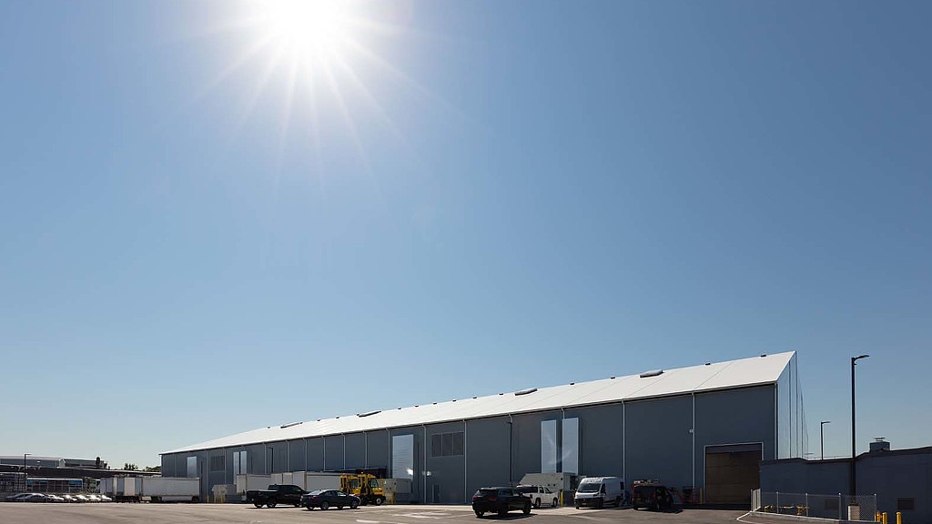 A building with a parking lot.