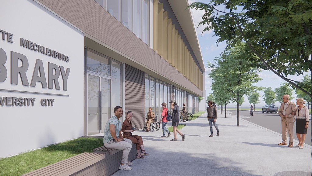 A group of people outside a building.