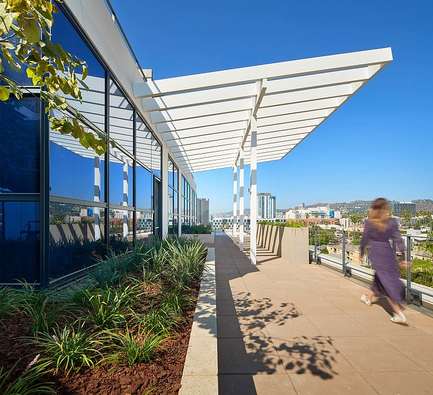 A woman walking on Epic tower terrace