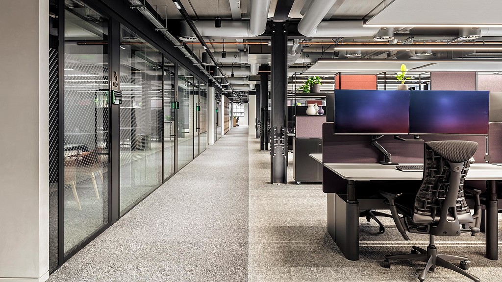 Financial services firm London headquarters hallway and workstations