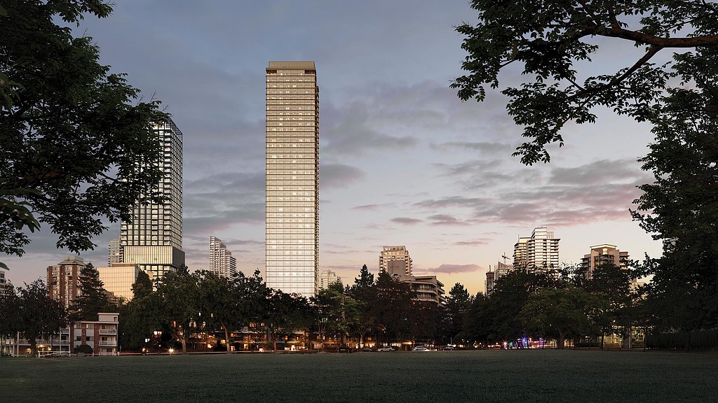 A body of water with buildings in the background.