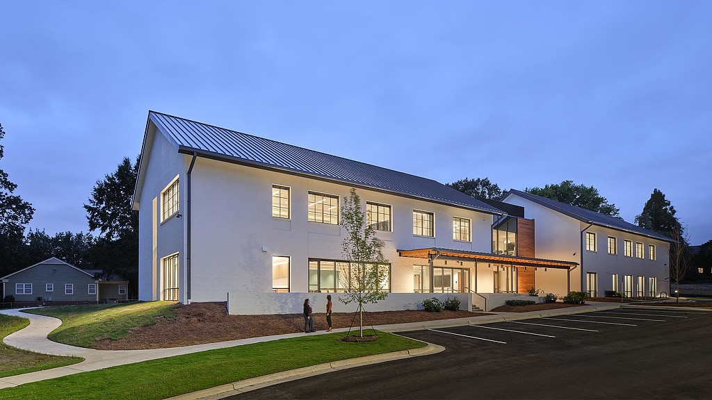 A building with a driveway.