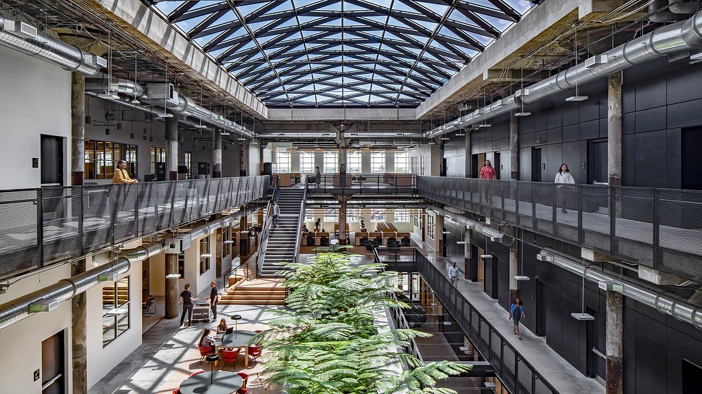 The inside arcade walkway at book depository with a large skylight