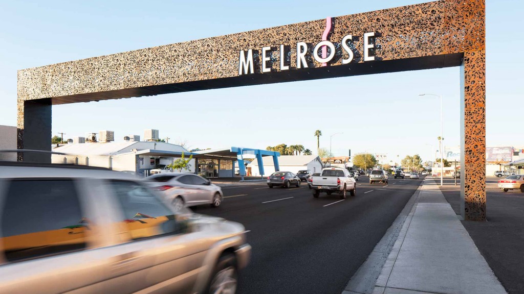 A street with cars and buildings.