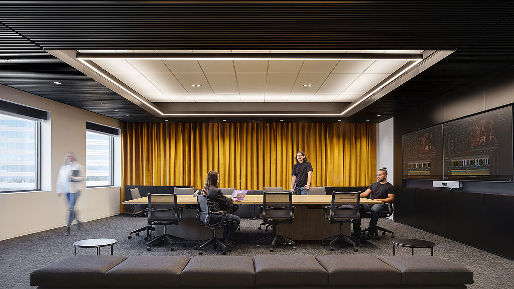 A group of people in a room.