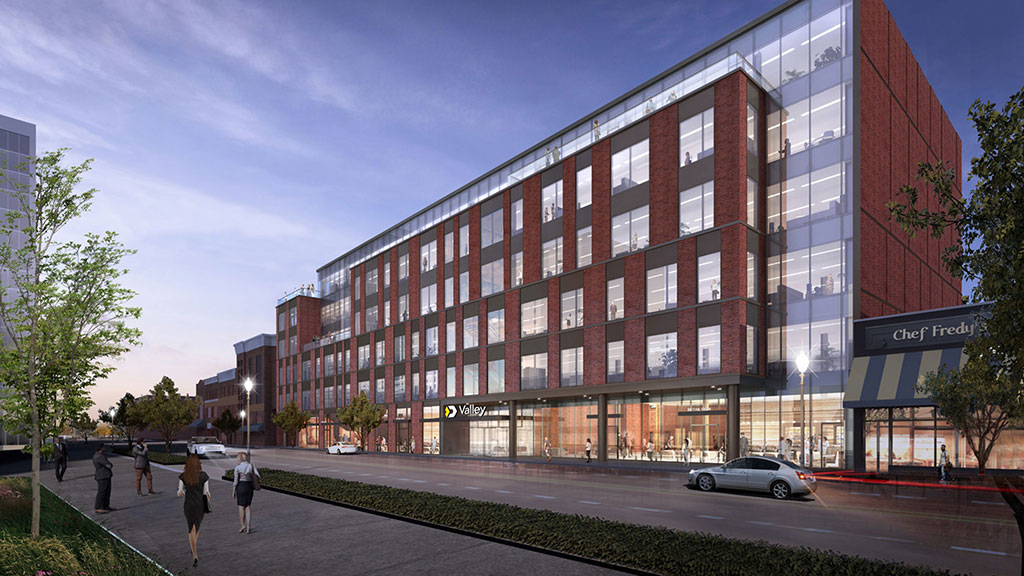 A building with a parking lot.