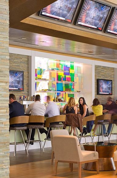 People sitting at tables in a restaurant.
