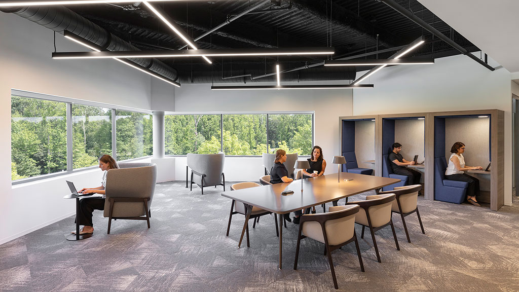 A group of people sitting around a table.