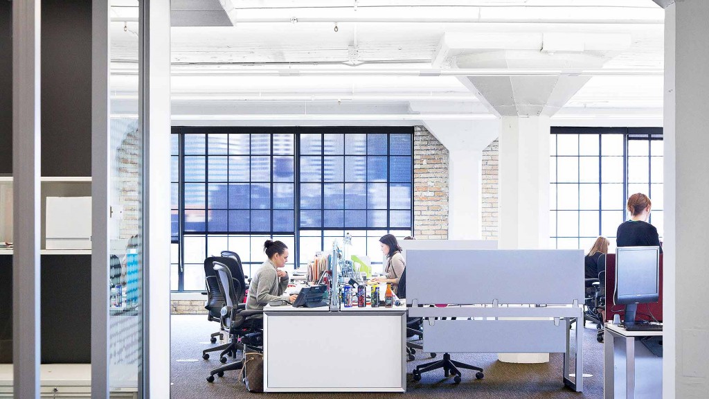 A group of people working in an office.