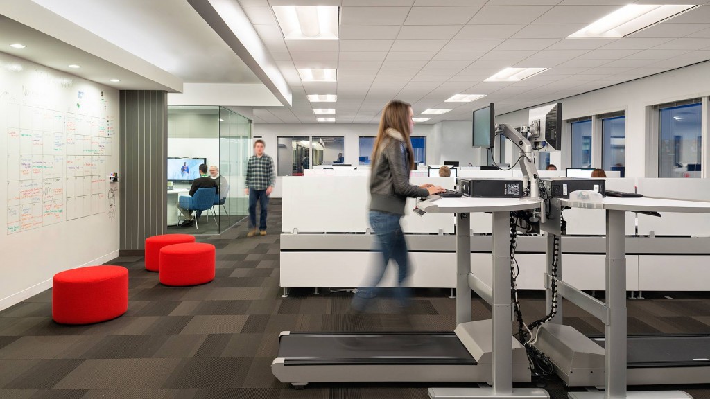 A person standing in an office.