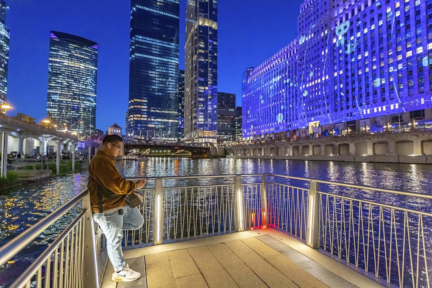 Art on the Mart nighttime view from Chicago river