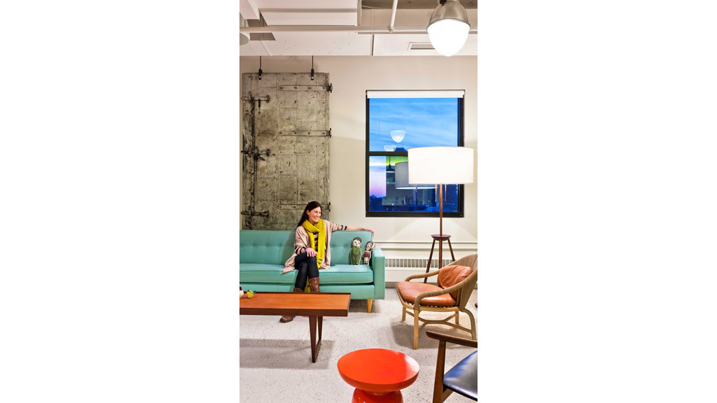 A person sitting on a couch.