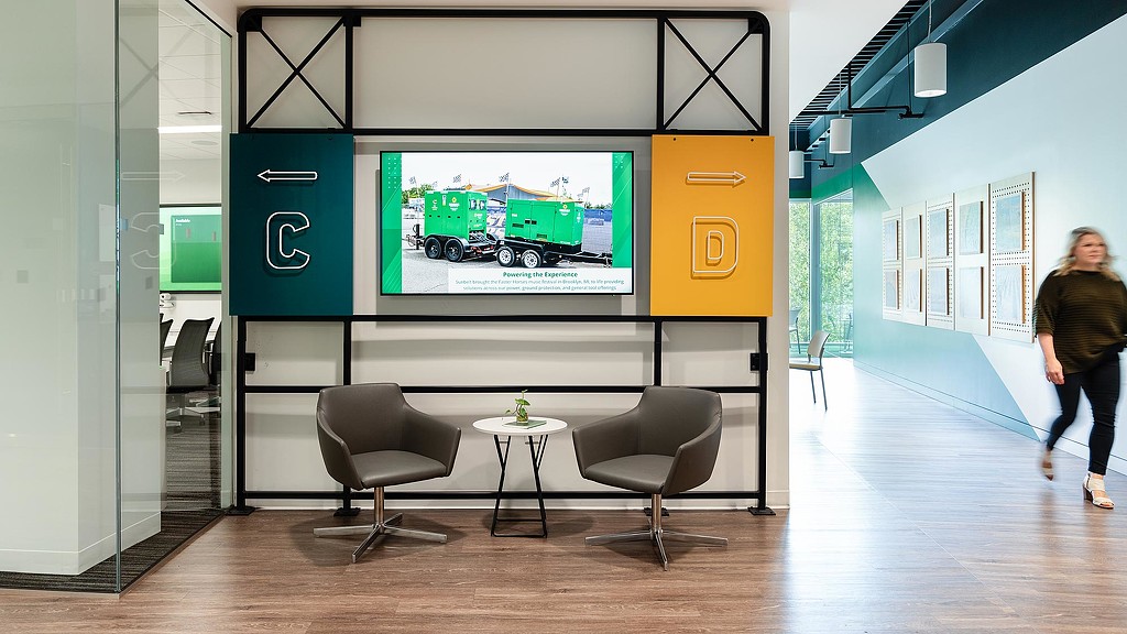 A person walking in a room.