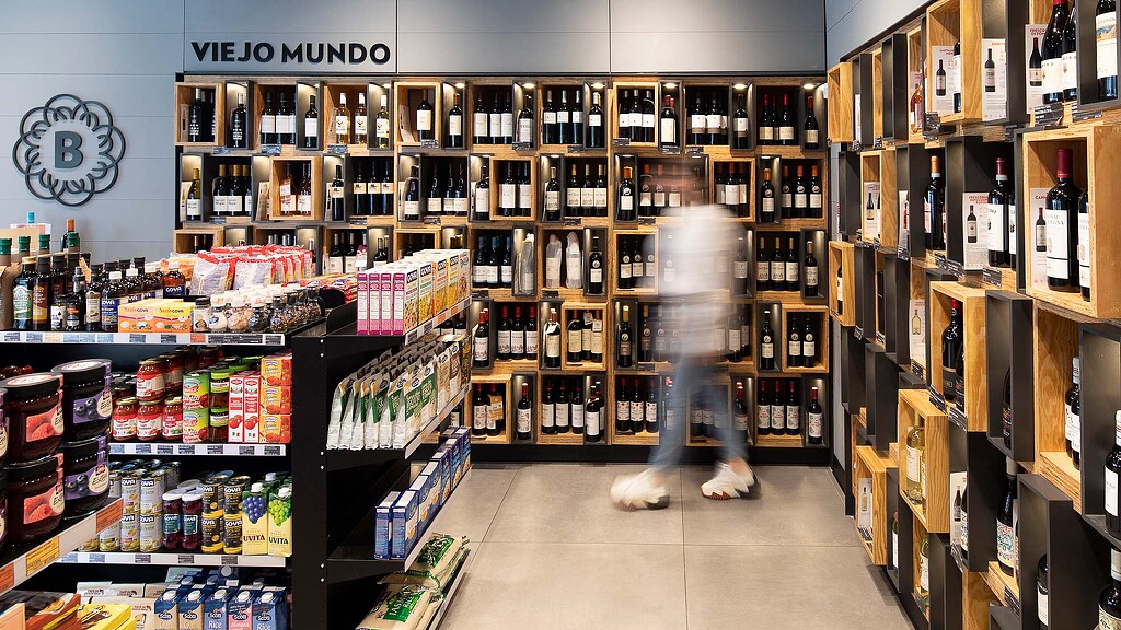 A person in a garment in a store.