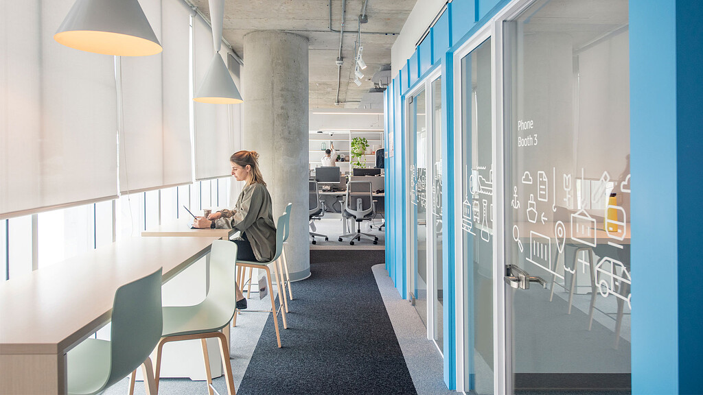 A person sitting at a desk.