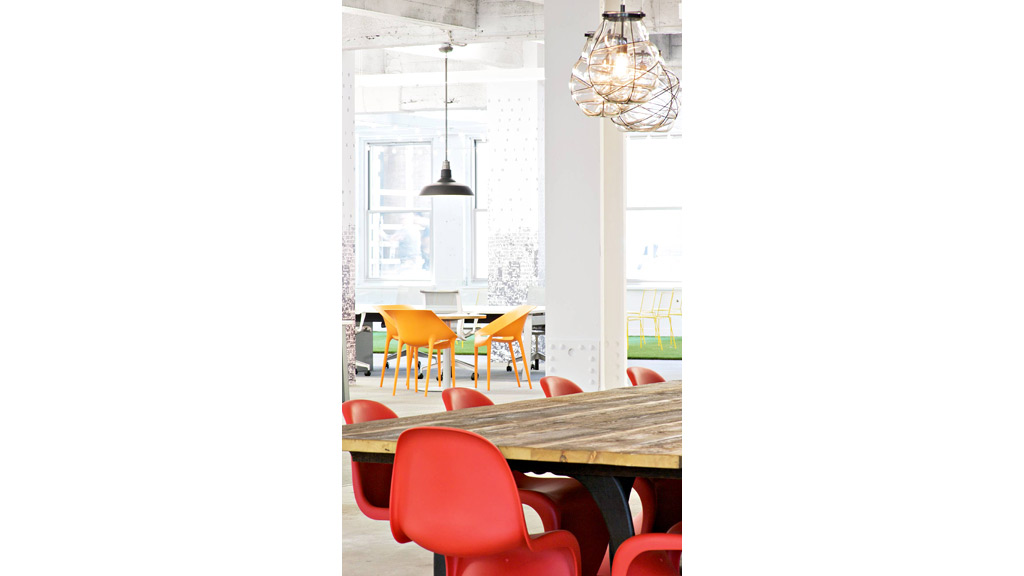 A table with chairs around it.