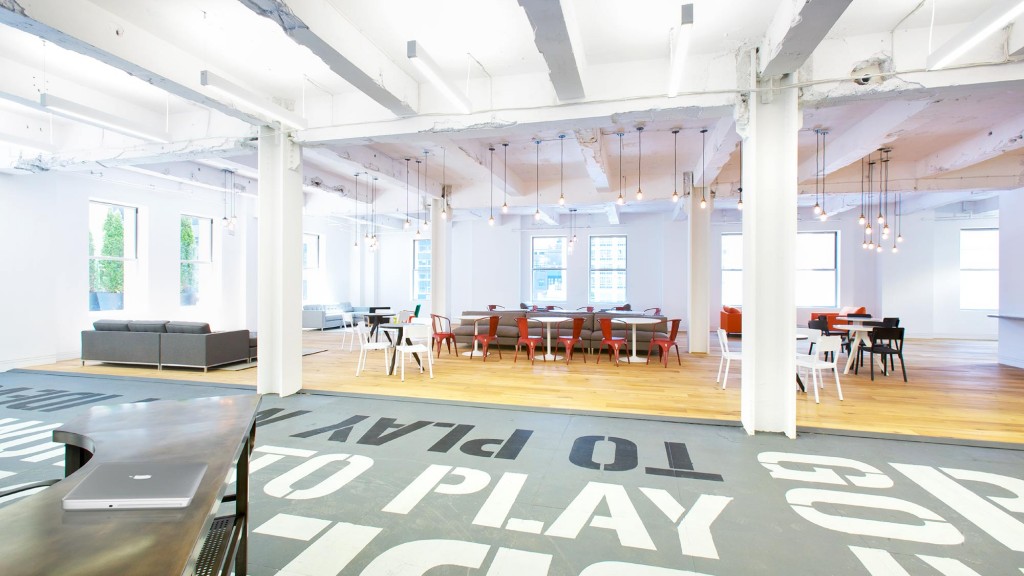 A room with tables and chairs.