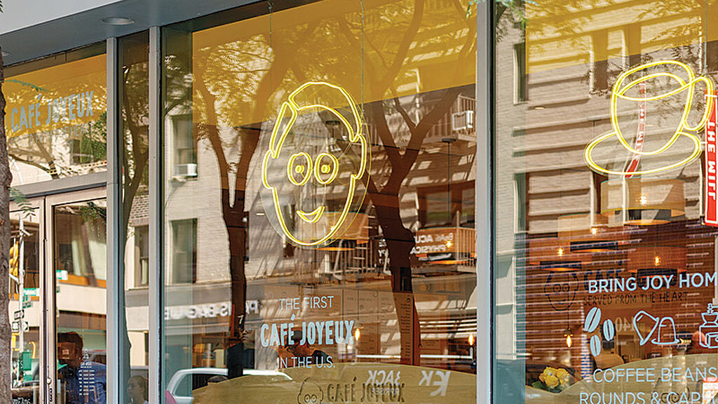 A glass front window with a clock.